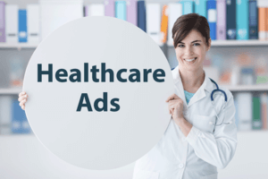 Smiling Doctor holding Healthcare Ads sign